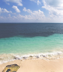 Tropical paradise image. Colorful Caribbean sea shore. Image has a vintage effect applied