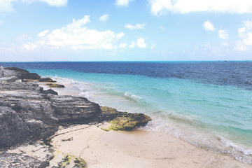 Tropical paradise image. Colorful Caribbean sea shore. Image has a vintage effect applied