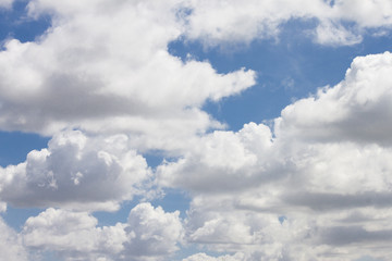 Naklejka na ściany i meble Nature of White cloud on the blue sky.