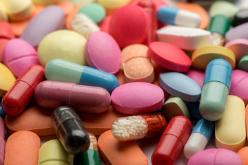 Pharmacy theme. Multicolored Isolated Pills and Capsules.