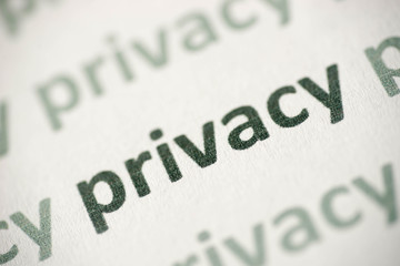 word privacy printed on paper macro