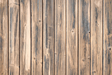 Obraz premium Brown wooden boards of oak color. Vintage old fence or wall of house. Fittings of screws. Background abstract pattern.