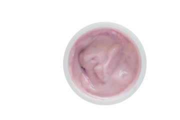 Yogurt in plastic cup - Top view photo of blue berry yoghurt isolated on white background