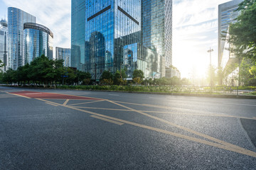 empty asphalt road with modern building in urban