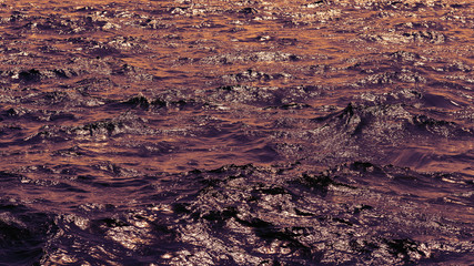 Sea surface with reflection at sunset. Selective focus. Color toned.