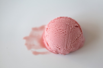 Strawberry ice cream ball isolated on white background. 