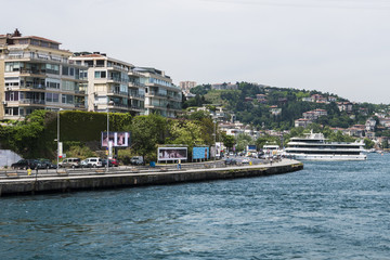 Beautiful View of Bosphorus Coastline in Istanbul with Exquisite wooden Houses and Boat