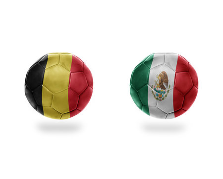 football balls with national flags of belgium and mexico. 3D illustration