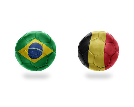 football balls with national flags of belgium and brazil. 3D illustration