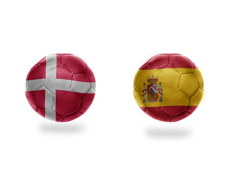 football balls with national flags of denmark and spain.