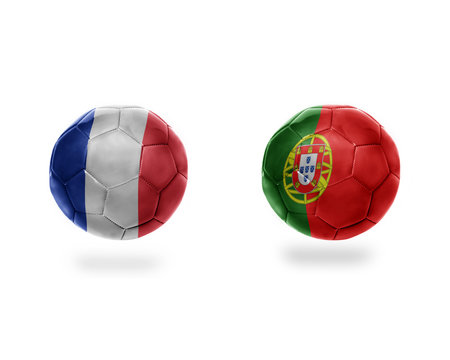 football balls with national flags of portugal and france.