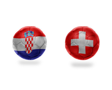 football balls with national flags of switzerland and croatia.
