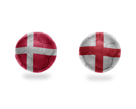 football balls with national flags of england and denmark.