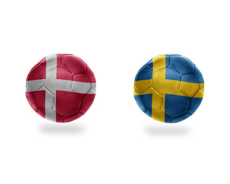 football balls with national flags of sweden and denmark.