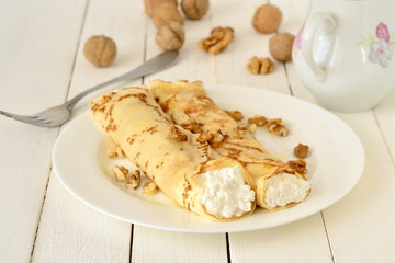 Pancakes with cottage cheese and sour cream