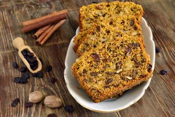 Spicy pumpkin cupcake with raisins and nuts, pie