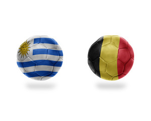 football balls with national flags of belgium and uruguay.