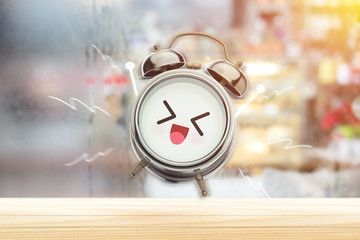 The alarm clock is happy in the morning at the bedroom. Good morning and Happy day. Have a good day...