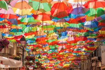 A street covered with umbrellas