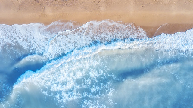 Aerial view on the waves. Beautiful natural seascape from air