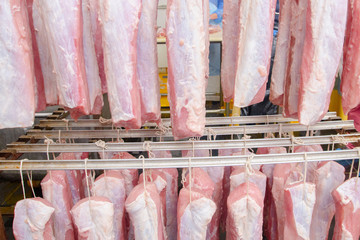 Pork. The line for the production of smoked delicacies. Industrial manufacture of sausage products....
