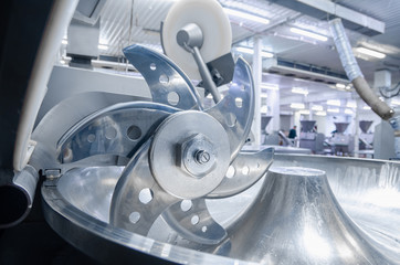 Cutter. Industrial cutter for grinding meat. Factory for the production of sausages and meat...
