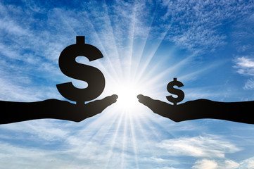 Silhouette of two hands, one holding a large sign Dolar having a large income, the other small