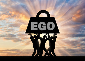 The silhouette of a selfish crowd keeps a heavy load - the ego