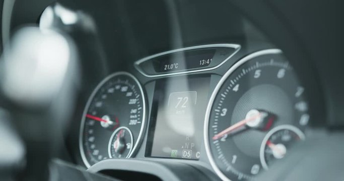 Cockpit of a black Car Driving