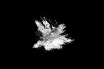 Launched white powder, isolated on black background.