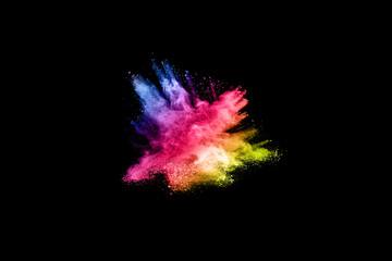 abstract colored dust explosion on a black background.abstract powder splatted background,Freeze motion of color powder exploding/throwing color powder, multicolored glitter texture.