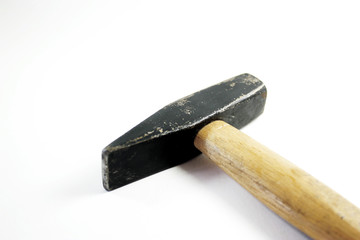 Hammer with wooden handle on isolated white background