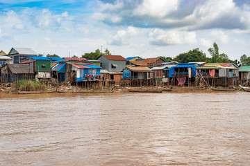 The village at the Mekong river called Akreiy Ksatr just on another side of the river is the capital city Phnom Penh, Cambodia.