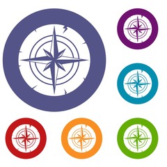Fototapeta premium Ancient compass icons set in flat circle red, blue and green color for web