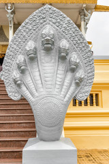 Statue of the Snake God, Naga in Cambodia Phnom Penh Royal Palace Silver Pagoda.
