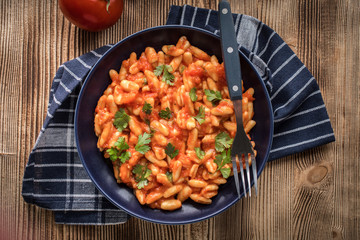 Cavatelli pasta with fresh tomato sauce.