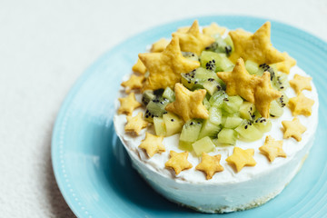 Kiwi cake with star shaped cookie,Copy space