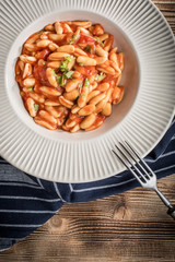 Cavatelli pasta with fresh tomato sauce.