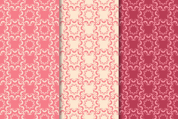 Set of red floral ornaments. Cherry pink vertical seamless patterns