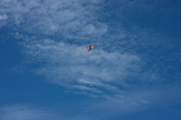 Fototapeta na wymiar Multi-color Kite and open Sky