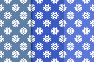 Set of floral ornaments. Vertical blue seamless patterns