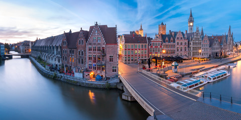 Panoramic aerial view of picturesque medieval buildings on the quay Graslei and Leie river at Ghent...