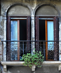 Beautiful architecture  Venice, Italy. Details of the windows and doors of the colorful houses. Street. Grand canal famous landmark panoramic view Venice Italy with blue sky white cloud.