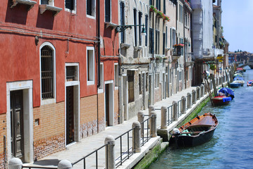 Grand canal famous landmark panoramic view Venice Italy with blue sky white cloud and gondola boat water. Beautiful architecture  Venice, Italy. 