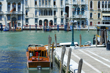 Grand canal famous landmark panoramic view Venice Italy with blue sky white cloud and gondola boat water. Beautiful architecture  Venice, Italy. 