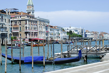 Grand canal famous landmark panoramic view Venice Italy with blue sky white cloud and gondola boat water. Beautiful architecture  Venice, Italy. 