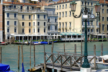 Grand canal famous landmark panoramic view Venice Italy with blue sky white cloud and gondola boat water. Beautiful architecture  Venice, Italy. 