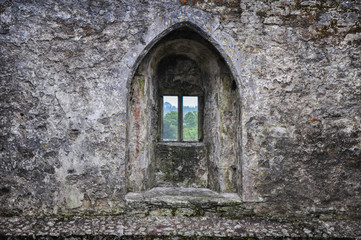 Fototapeta na wymiar Castle window wall 