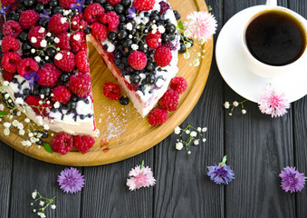 cheese cake and tea on a wooden background