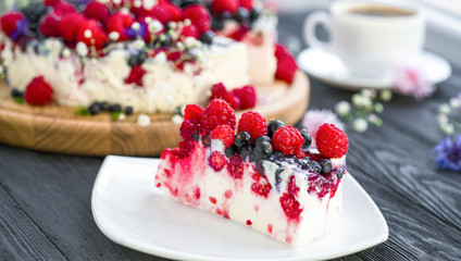 .cheese cake and tea on a wooden background